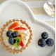 Crisp gluten-free tart shell filled with creamy cashew